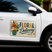 White car with a 'Floral Delivery' magnet on the side