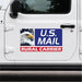 U.S. Mail Rural Carrier sticker with an eagle on a white vehicle door.