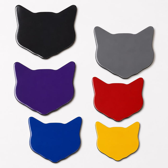 Set of six colorful cat-shaped blank magnets on a white background
