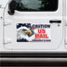 Car door with a decal featuring an eagle and text 'Caution US Mail Frequent Stops' on a white vehicle.
