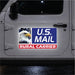 Car door with a U.S. Mail Rural Carrier sticker featuring an eagle.