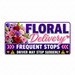 Floral delivery sign with colorful flowers and warning symbols.