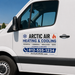 HVAC vehicle sign displayed on a white service van door with heating and cooling company branding