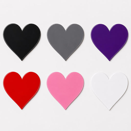 Set of heart-shaped objects in various colors on a white background