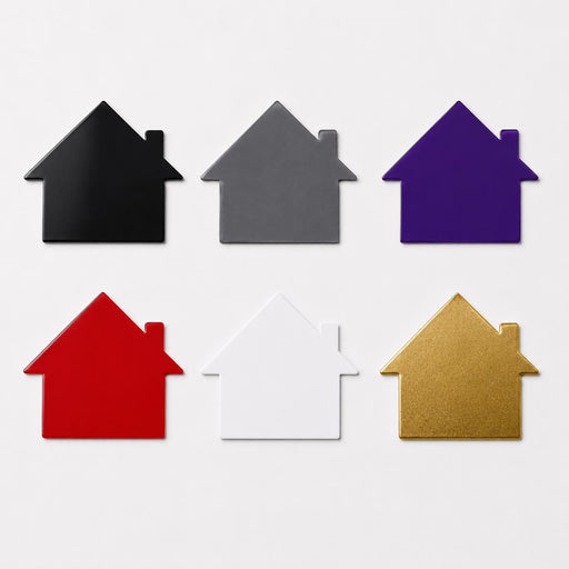 Set of house-shaped magnetic signs in various colors on a white background