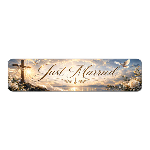 Decorative banner with 'Just Married' text, cross, and sunset design on a white background