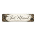 Decorative sign with 'Just Married' text on a white background