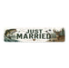 Decorative sign with 'Just Married' text, fish, and deer illustrations on a white background.