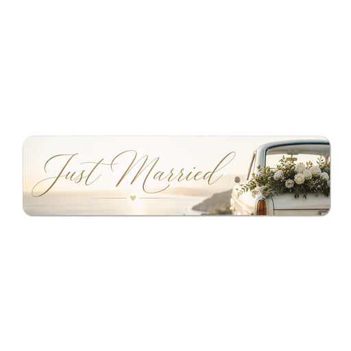 Decorative banner with 'Just Married' text and a car with flowers on a white background