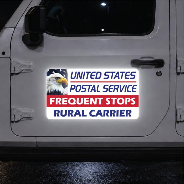 United States Postal Service sticker on a vehicle door with an eagle emblem.