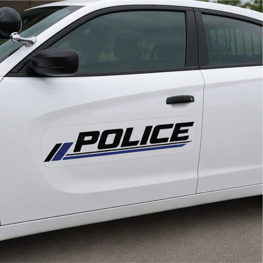 White police car with 'POLICE' decal on a gray surface
