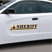 Sheriff magnetic signs on a white vehicle