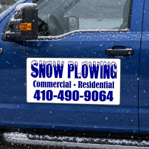 snow plowing magnetic sign with blue lettering on a blue truck. 