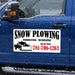 picture of a snow plowing magnetic sign on a blue truck that is a snow plowing business. 