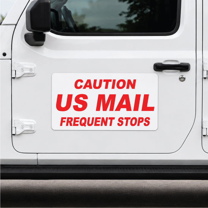 White Jeep vehicle door with a red and black 'Caution US Mail Frequent Stops' magnetic car sign.