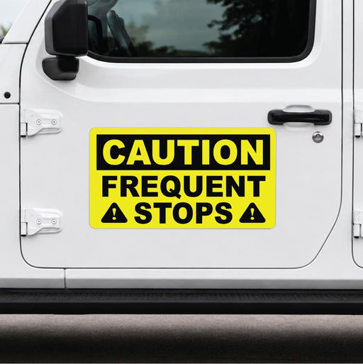 Yellow caution sign on a white vehicle door with 'CAUTION FREQUENT STOPS' text.